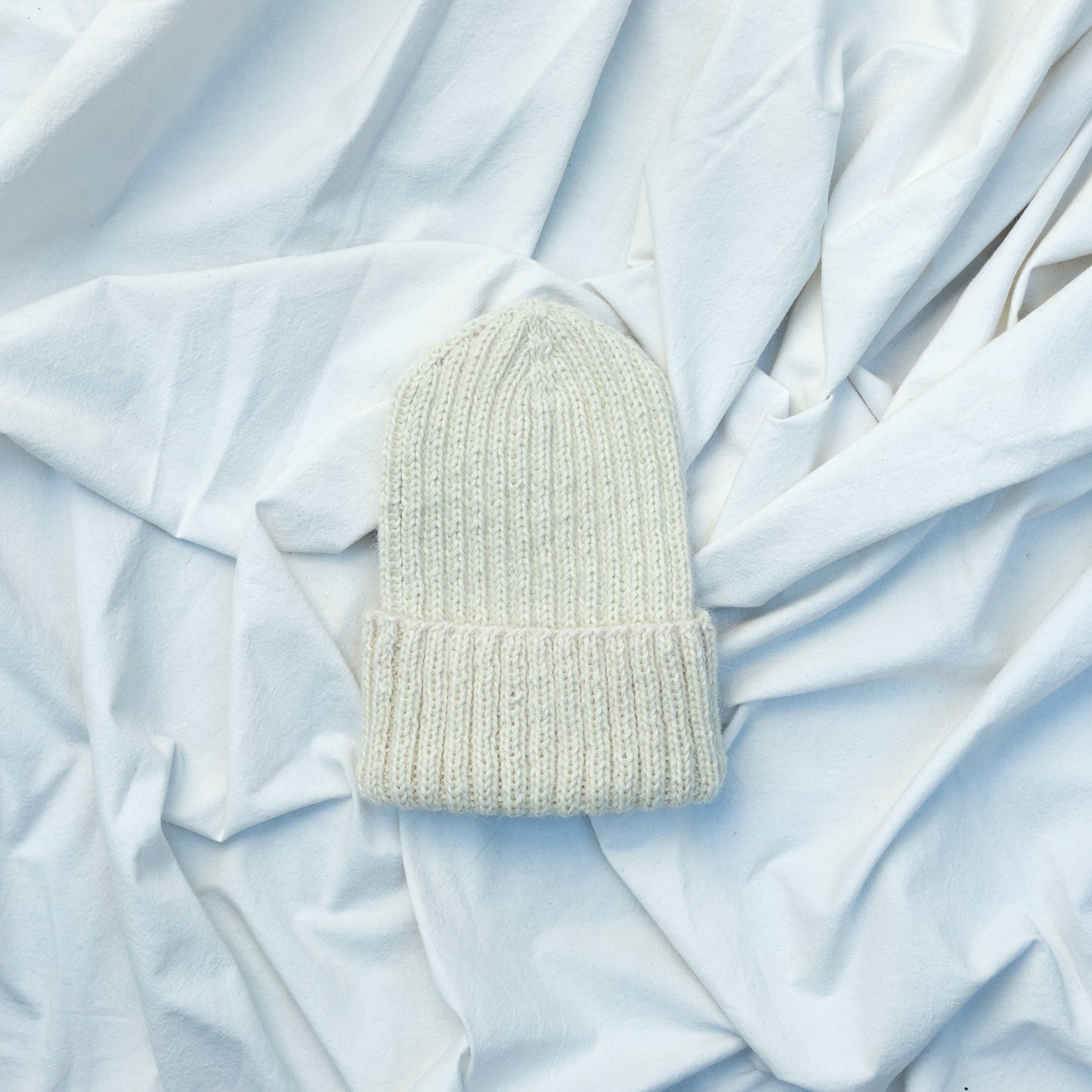 Natural coloured soft beanie with rib detail hand knitted, alpaca wool