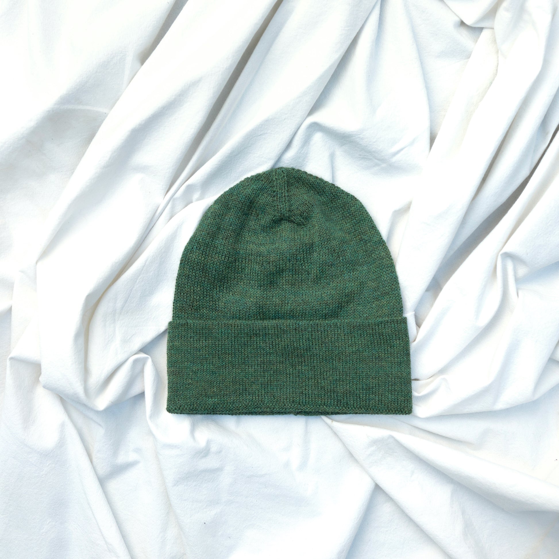 Green coloured alpaca wool slouchy beanie hat