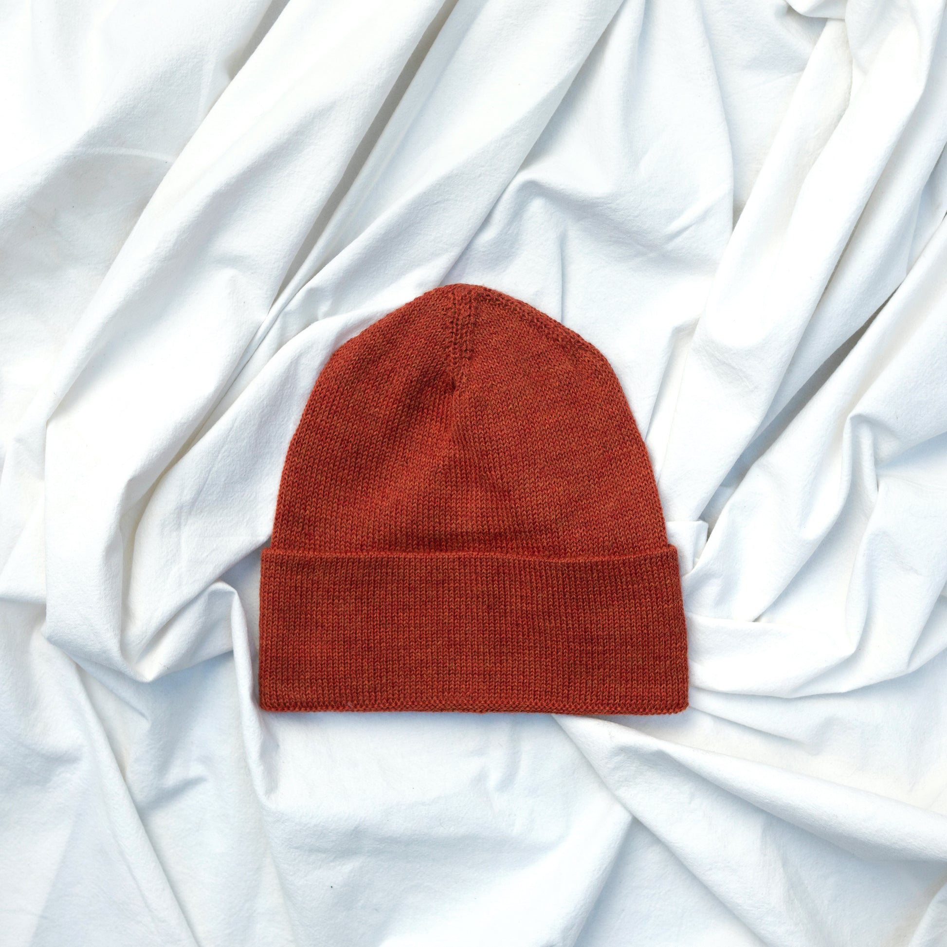 Orange coloured alpaca wool slouchy beanie hat