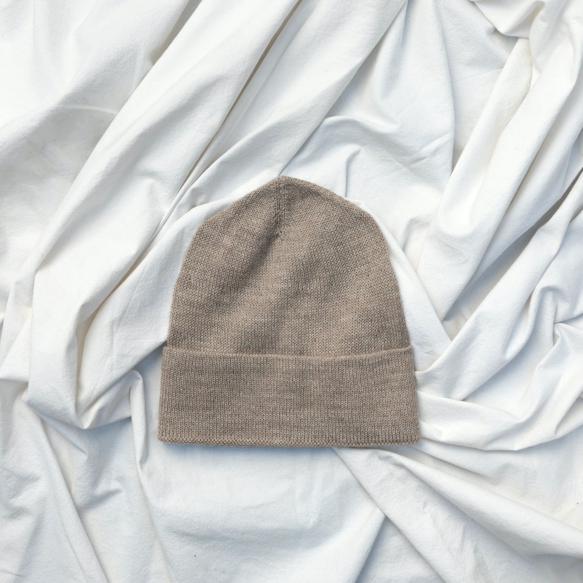 Beige coloured alpaca wool slouchy beanie hat