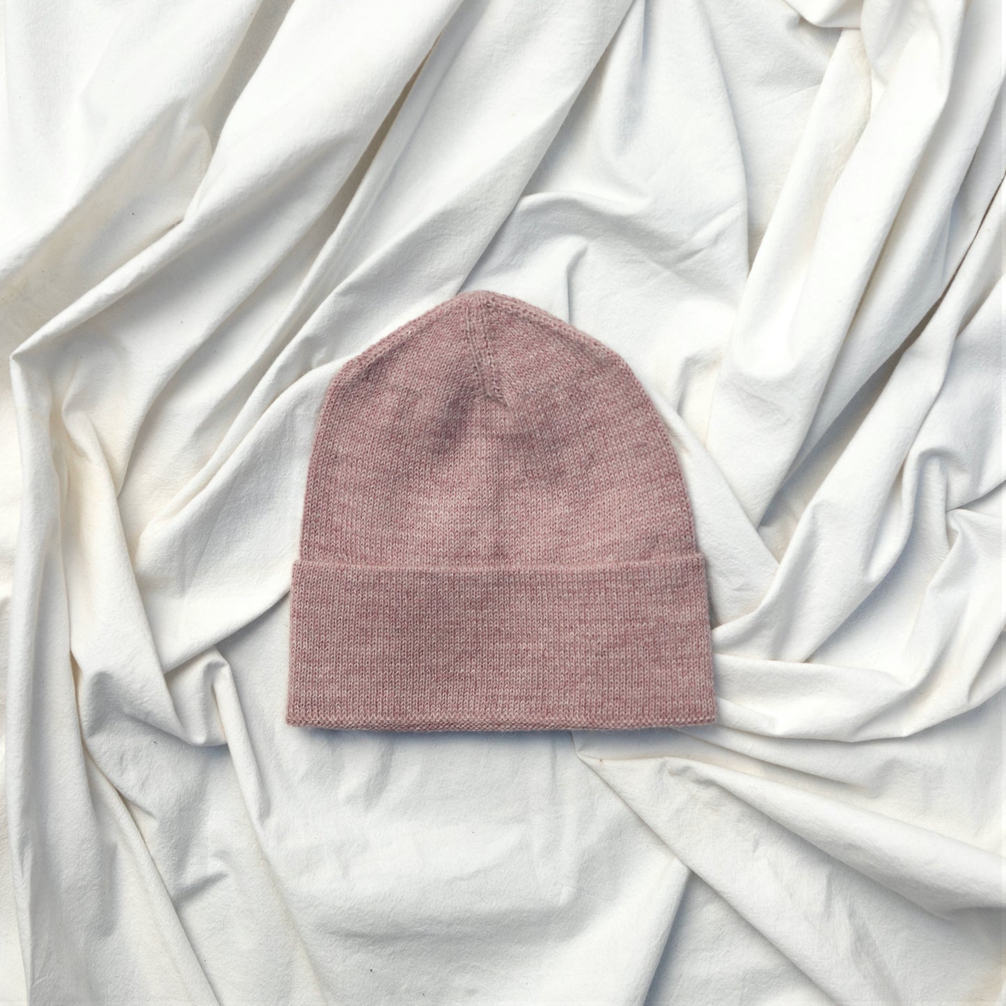 Soft pink coloured alpaca wool slouchy beanie hat