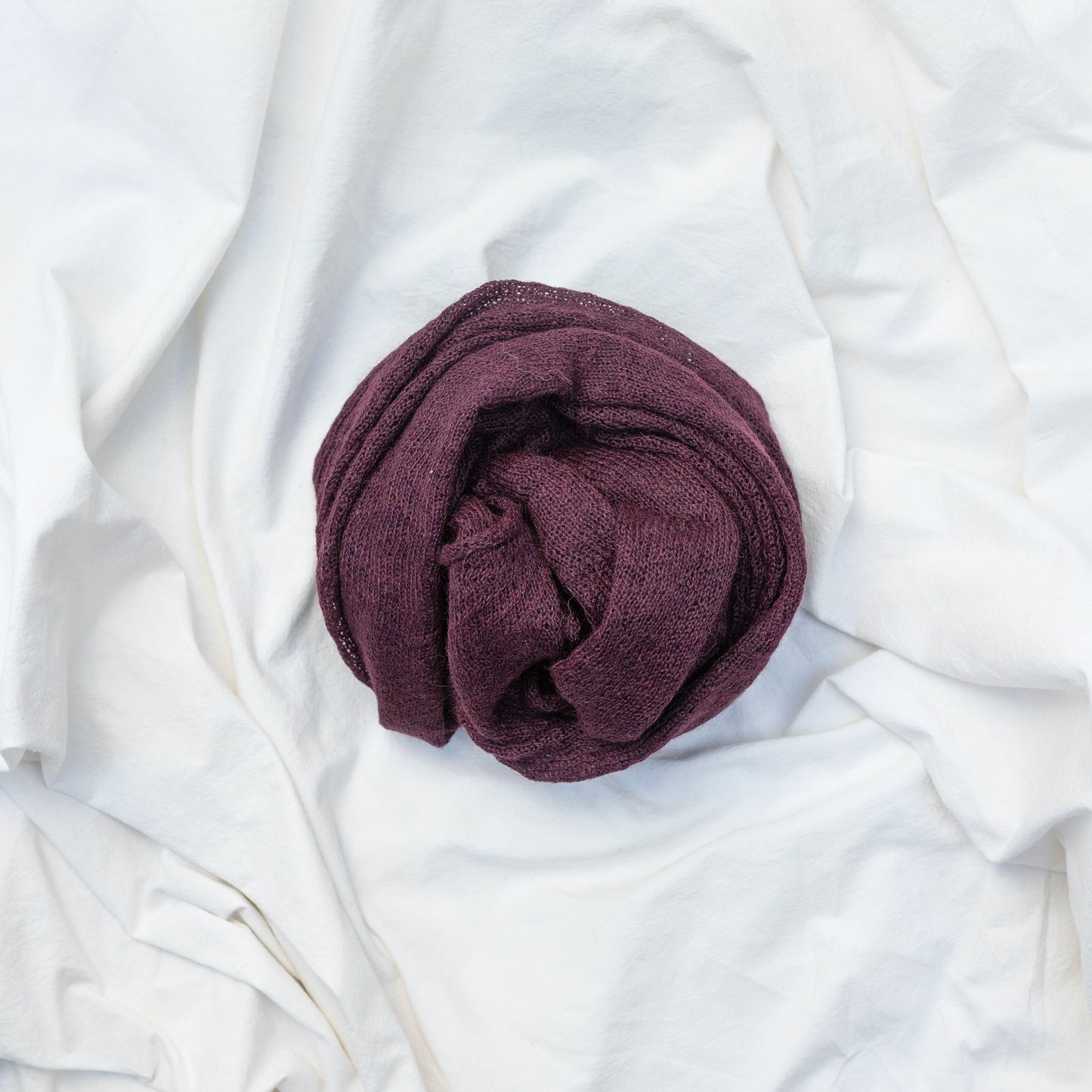 Purple coloured lightweight and delicately woven scarf. Handmade by artisans