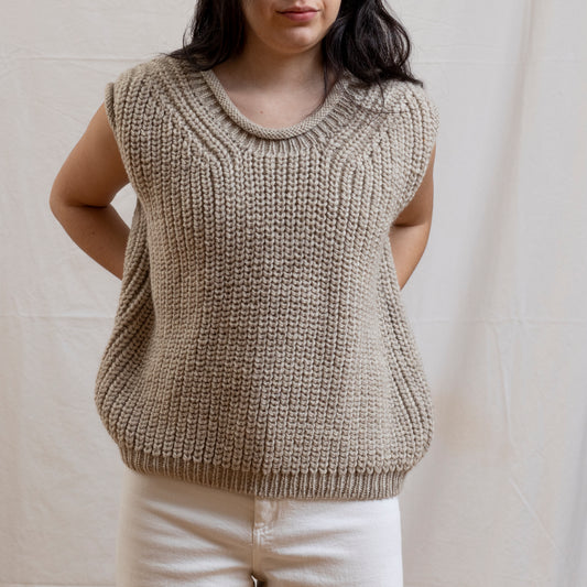 Woman wearing luxury alpaca wool hand-knitted vest.