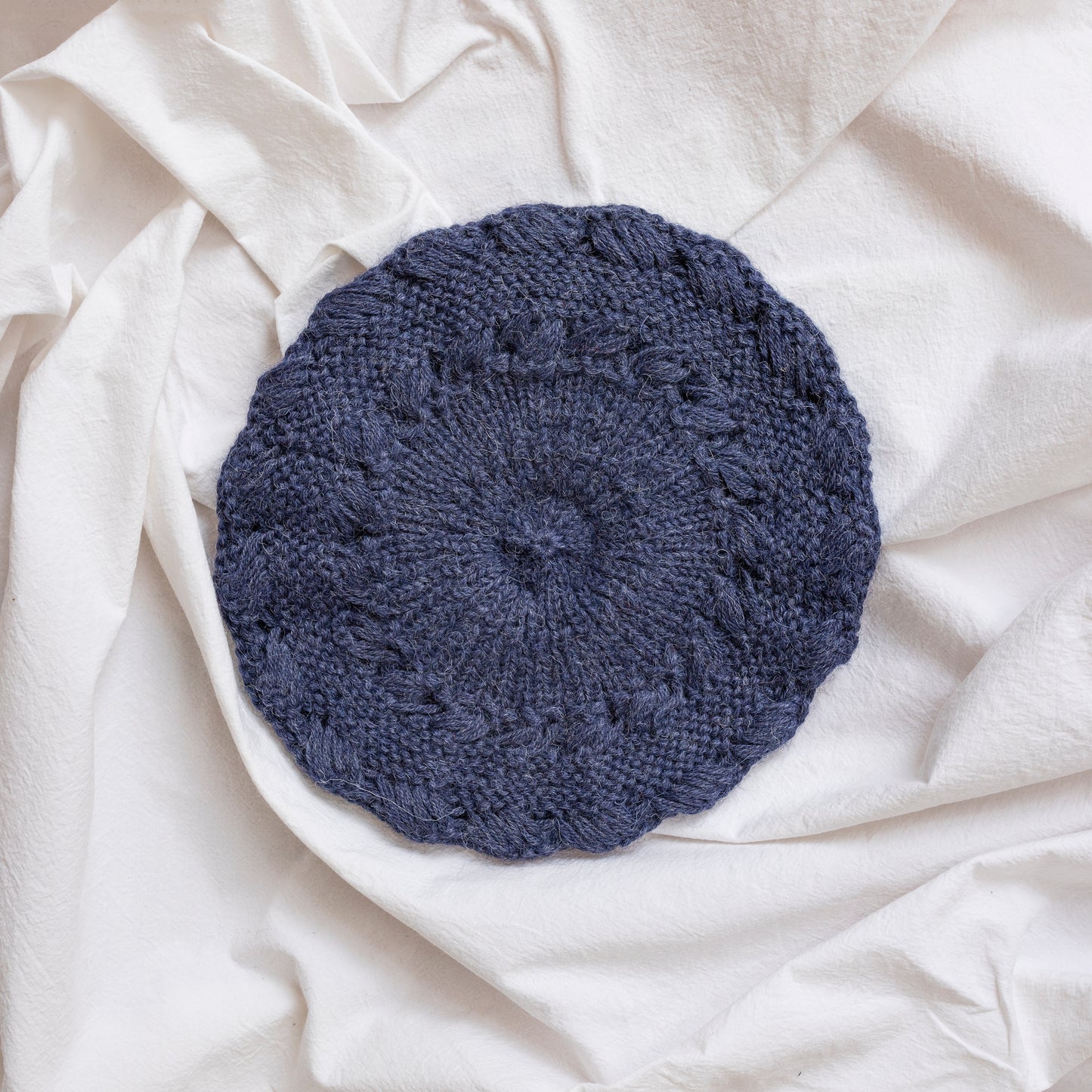 Blue coloured hand-knitted alpaca wool beret. Gorgeous, flattering and soft.