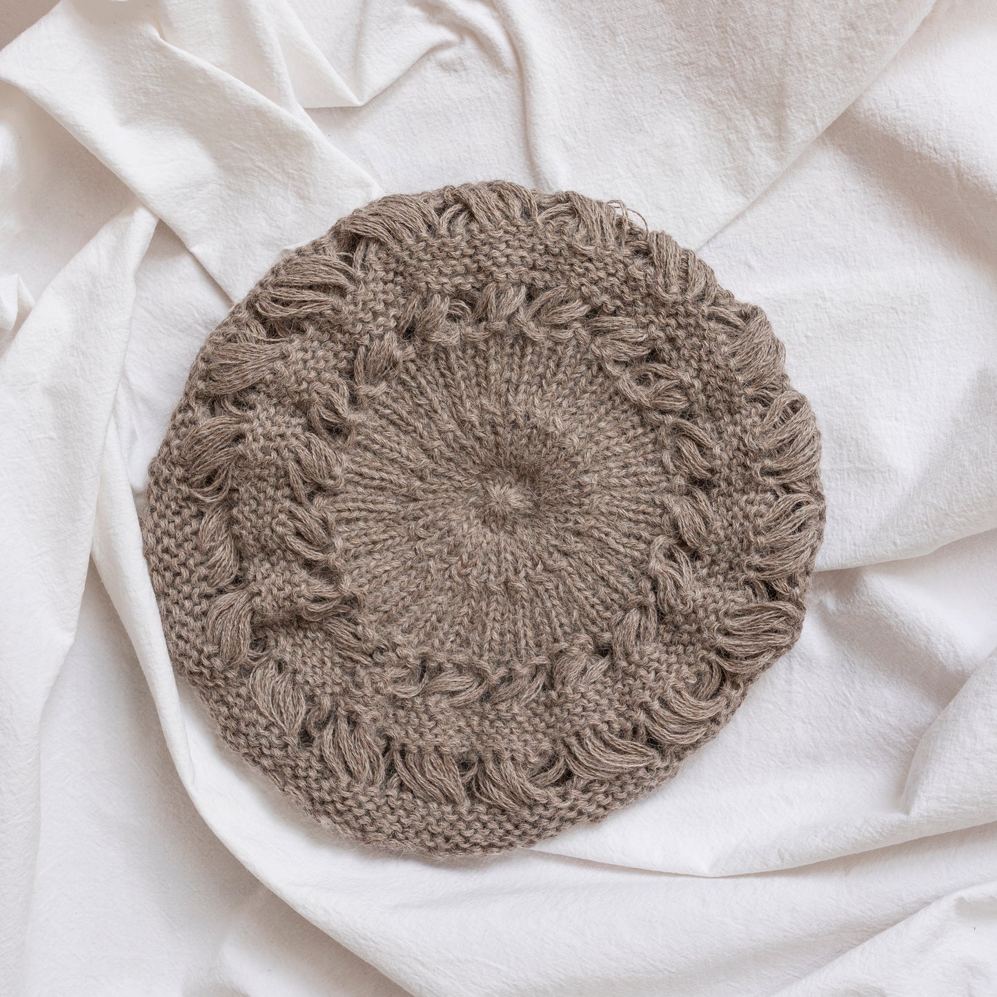 Oatmeal coloured hand-knitted alpaca wool beret. Gorgeous, flattering and soft.