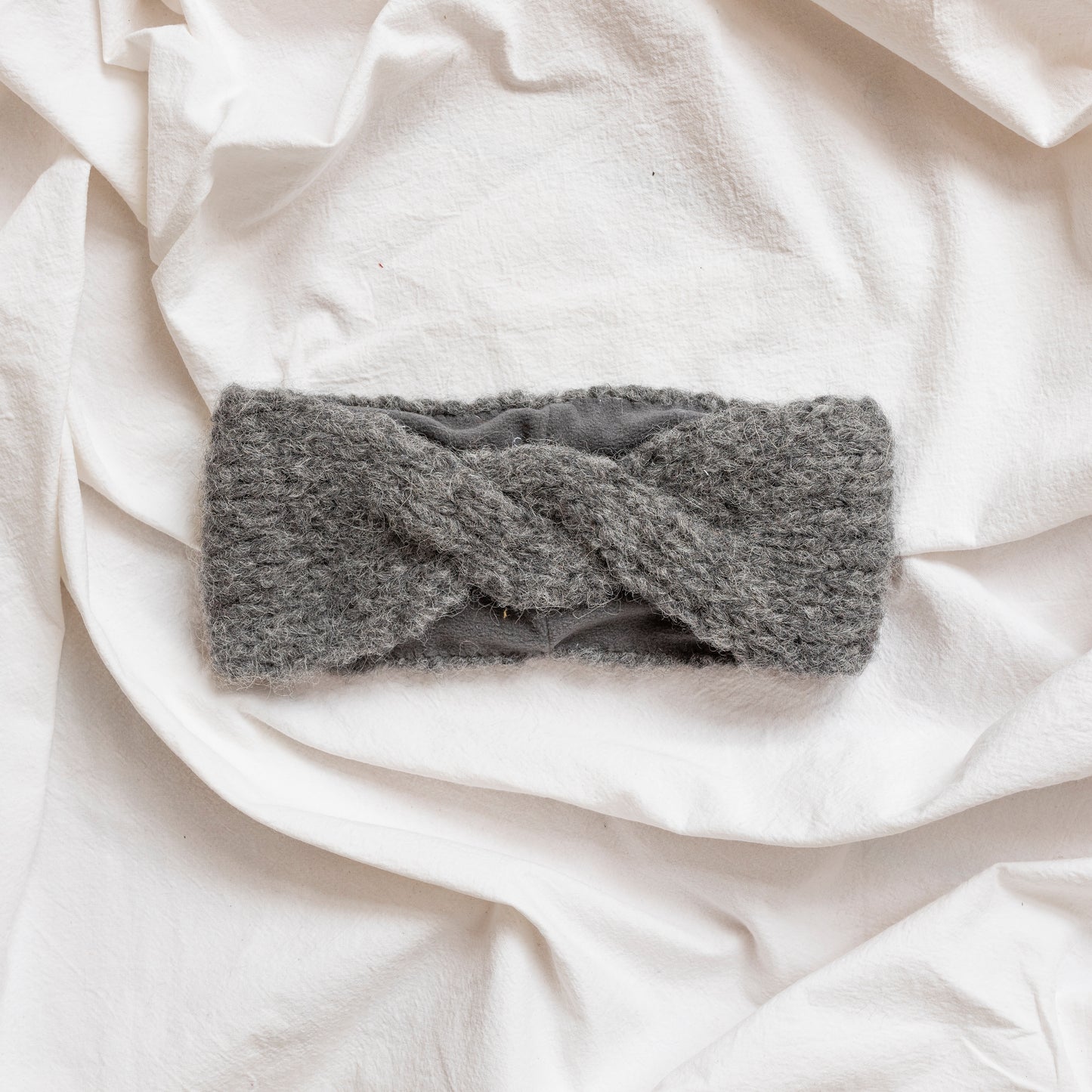 Hand-knitted light grey soft alpaca headband