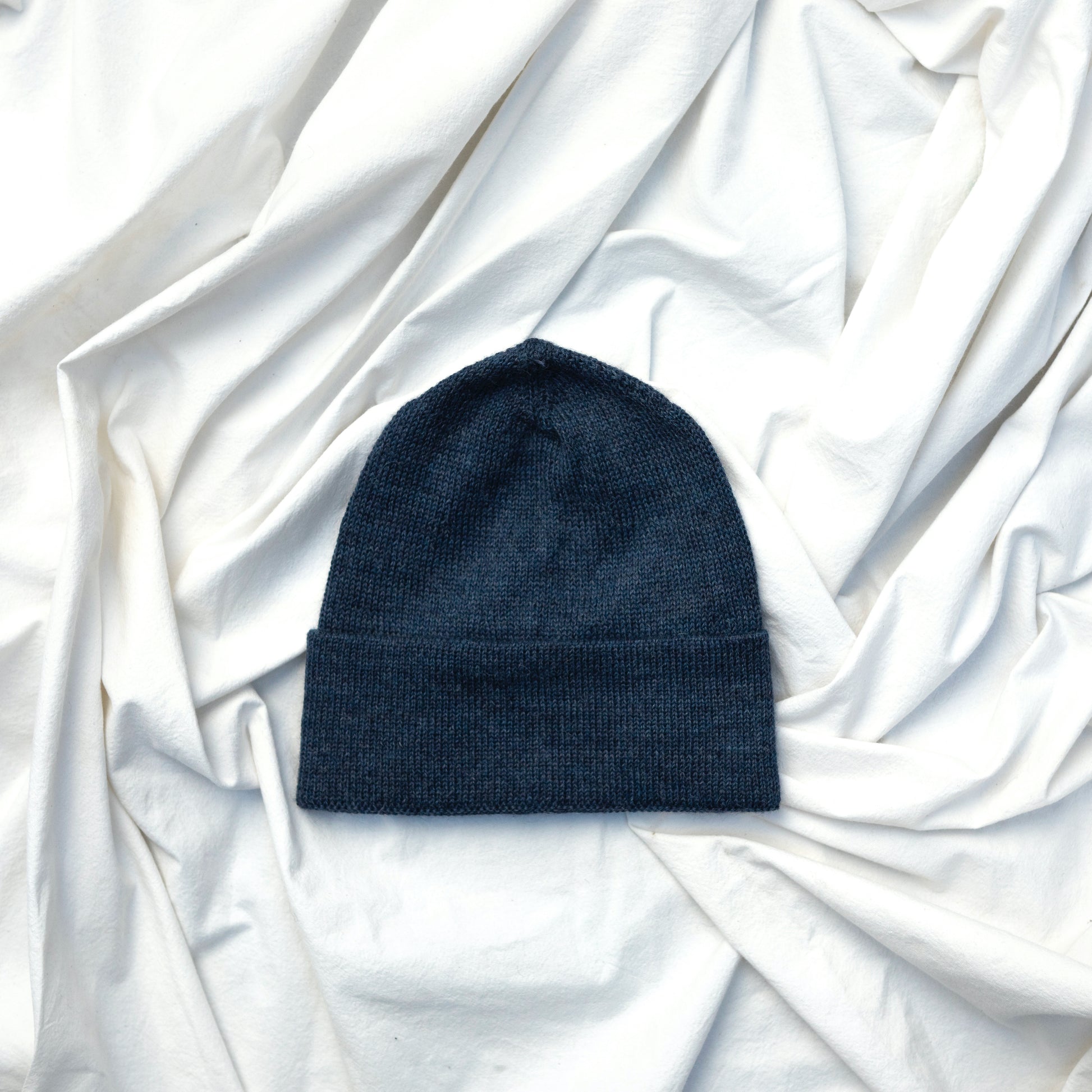 Dark blue coloured alpaca wool slouchy beanie hat 