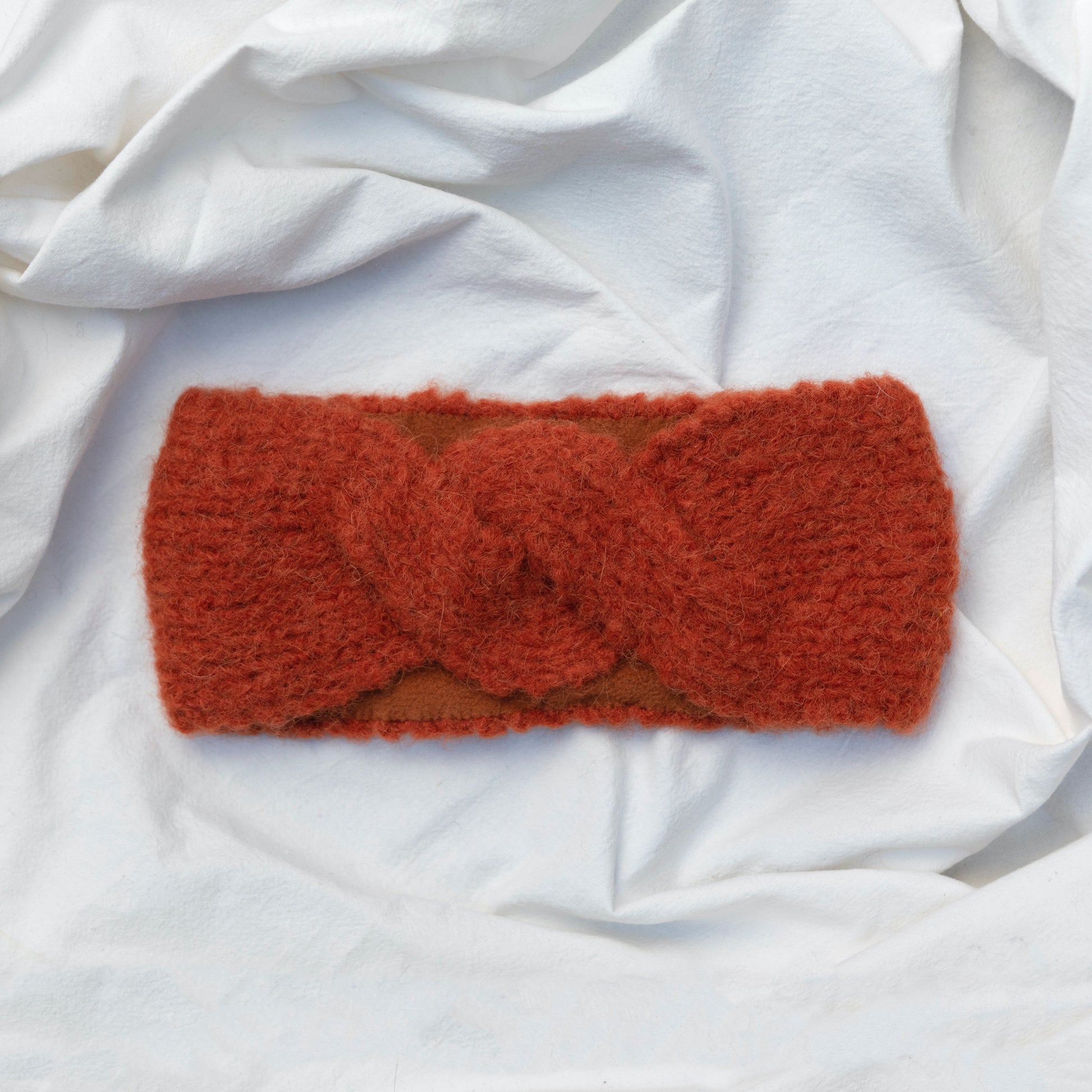 Hand-knitted, artisan, orange colour, soft alpaca wool headband