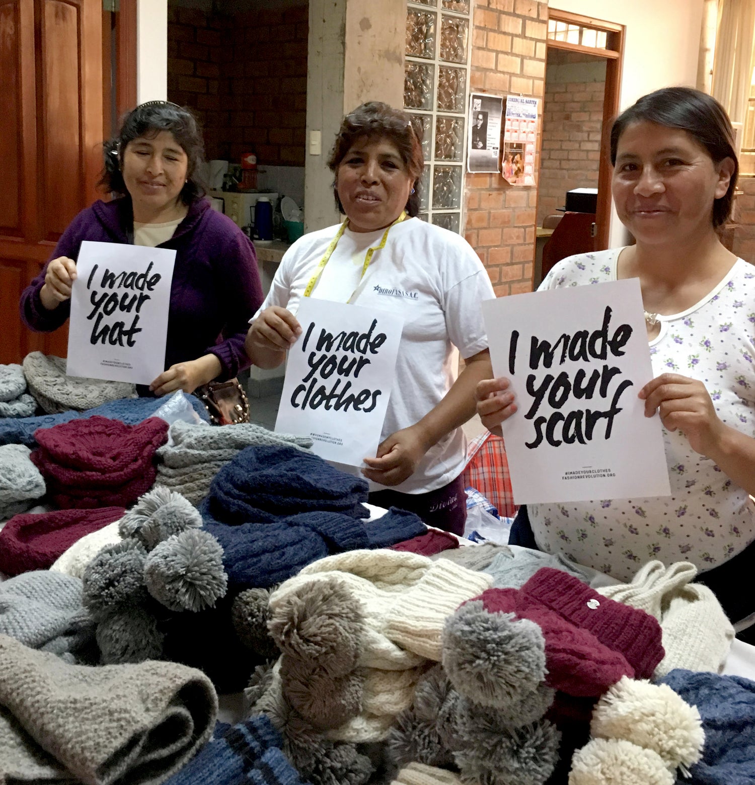 Peruvian women's collective group photo, smiling and happy