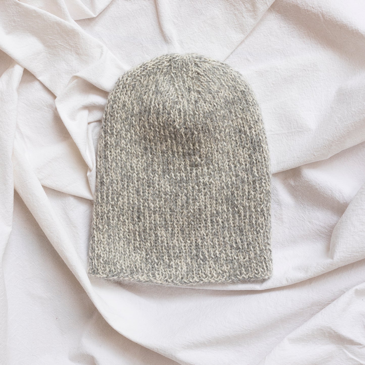  Soft and luxurious alpaca knit fisherman's beanie in color beige. 